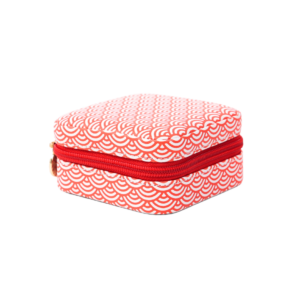 ALT A closed square PU leather jewelry case featuring a red and white scalloped wave pattern, a red zipper closure with a gold-tone pull, and a structured, hard-sided shape.