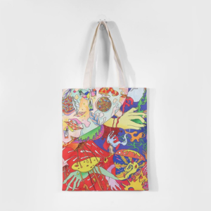 ALT A printed canvas shopper tote bag hanging on a hook, featuring a vibrant abstract art print with bold colors including red, yellow, blue, and green.