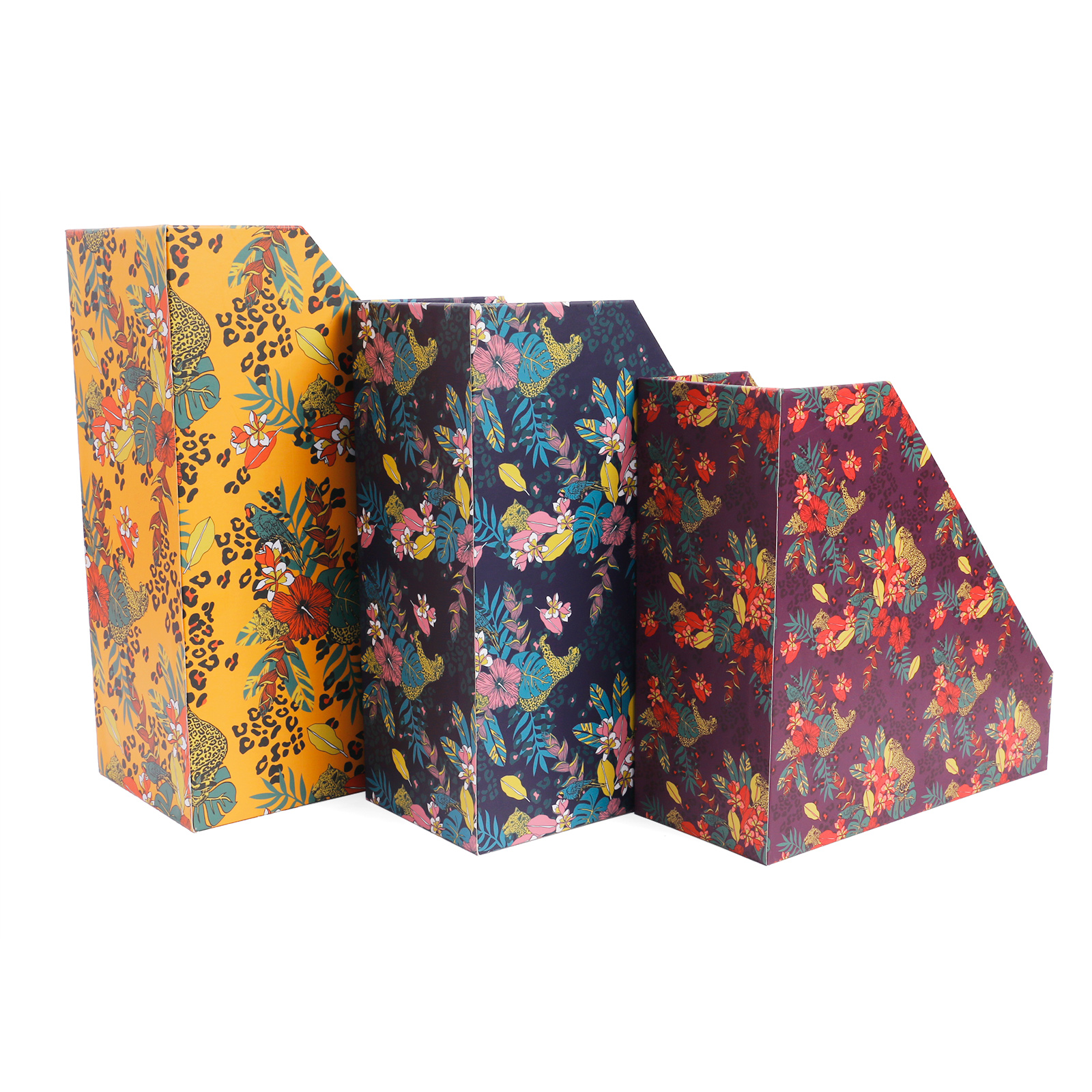 ALT A set of three cardboard file holders with a slanted open-top design, featuring a vibrant tropical jungle print with leopards, monstera leaves, and pink flowers in yellow, navy