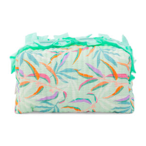 ALT Front view of a mint green leaf-print cotton makeup bag featuring vertical channel quilting, a central silver zipper, and a mint green ruffled trim on both sides of the zipper
