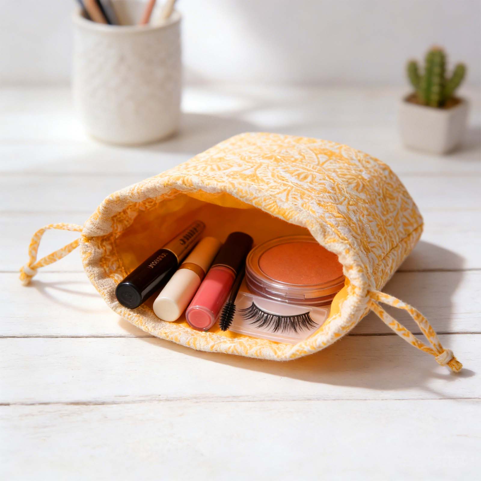 Mini drawstring jewelry pouch in printed pattern for rings and necklaces